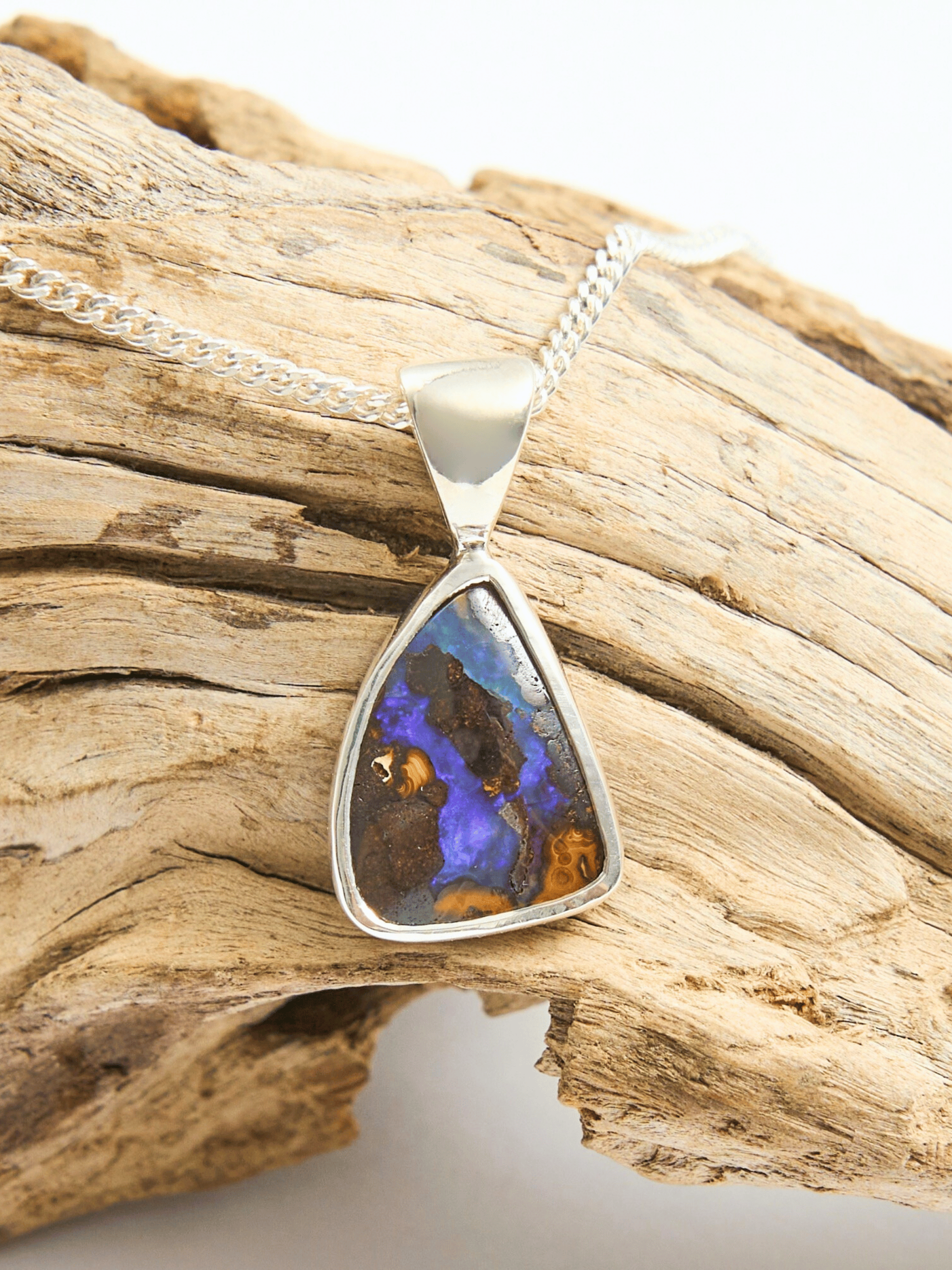 Blue Flash Boulder Opal Silver Pendant