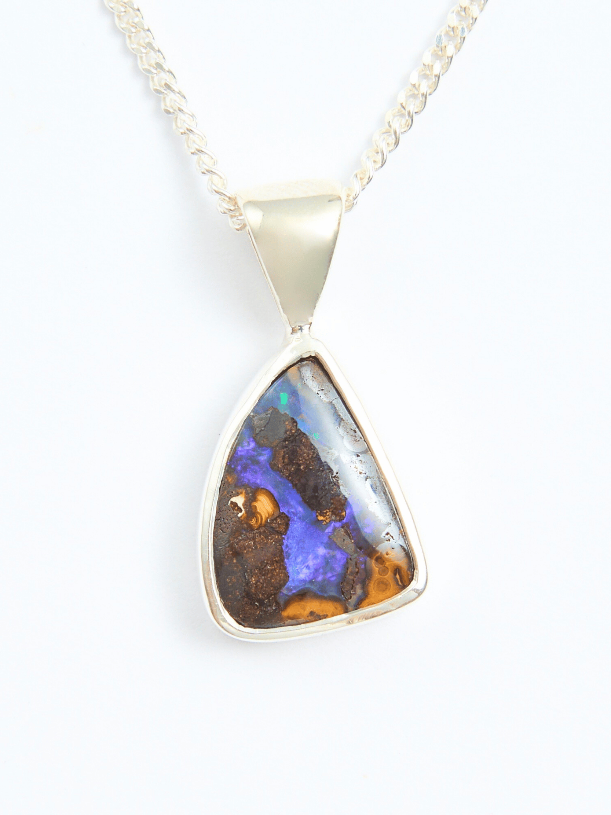 Blue Flash Boulder Opal Silver Pendant