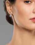 Australian Blue Boulder Opal Drop Silver Earrings with Blue Sapphires on model