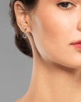 Australian Boulder Opal Drop Silver Earrings with Oval Sapphires on model