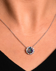Necklace with a colorful opal diamonds on a lady