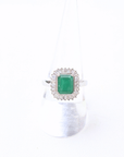 Emerald Sunburst Halo Silver Ring