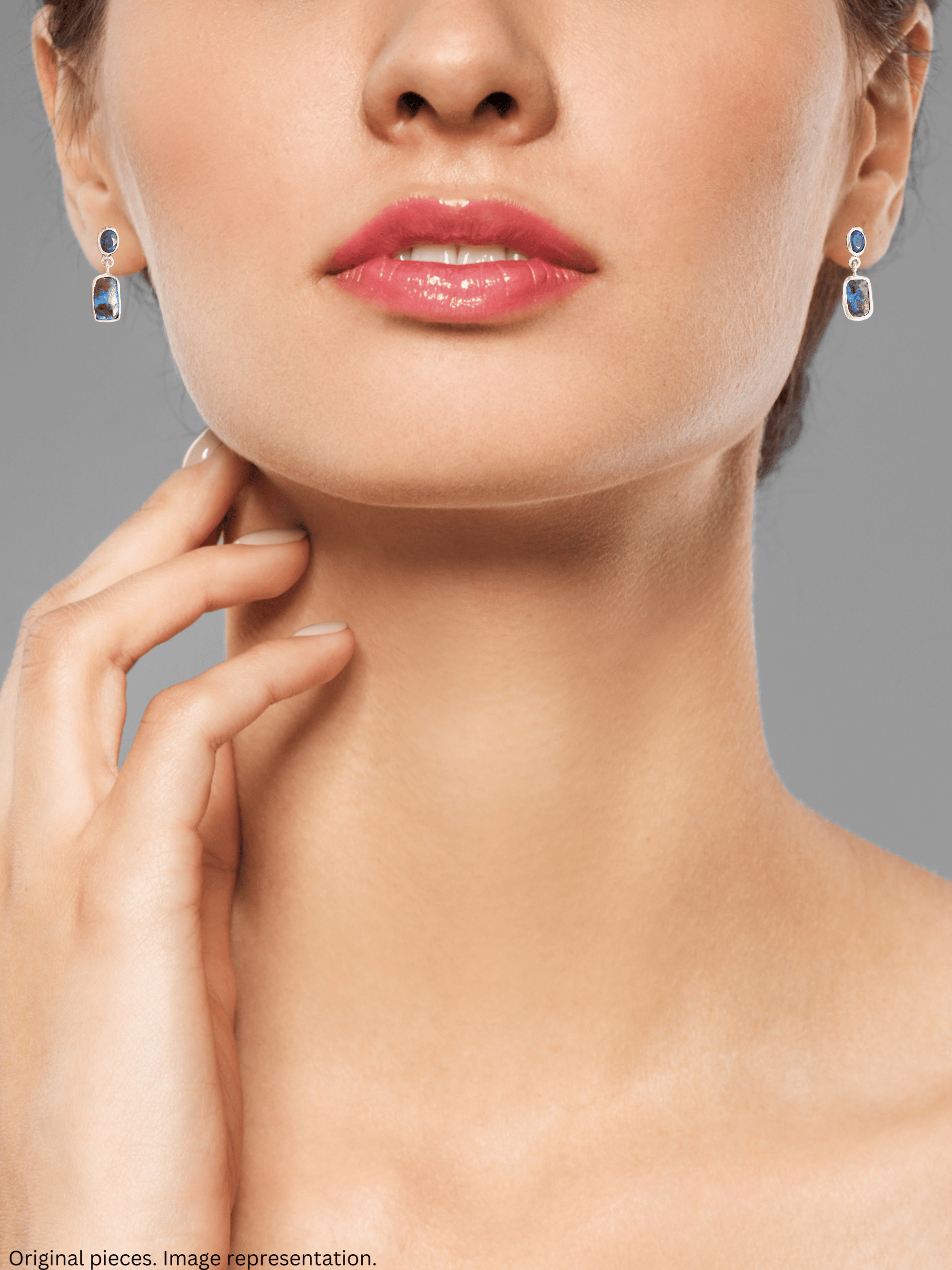 Australian Blue Boulder Opal Drop Silver Earrings with Blue Sapphires on model
