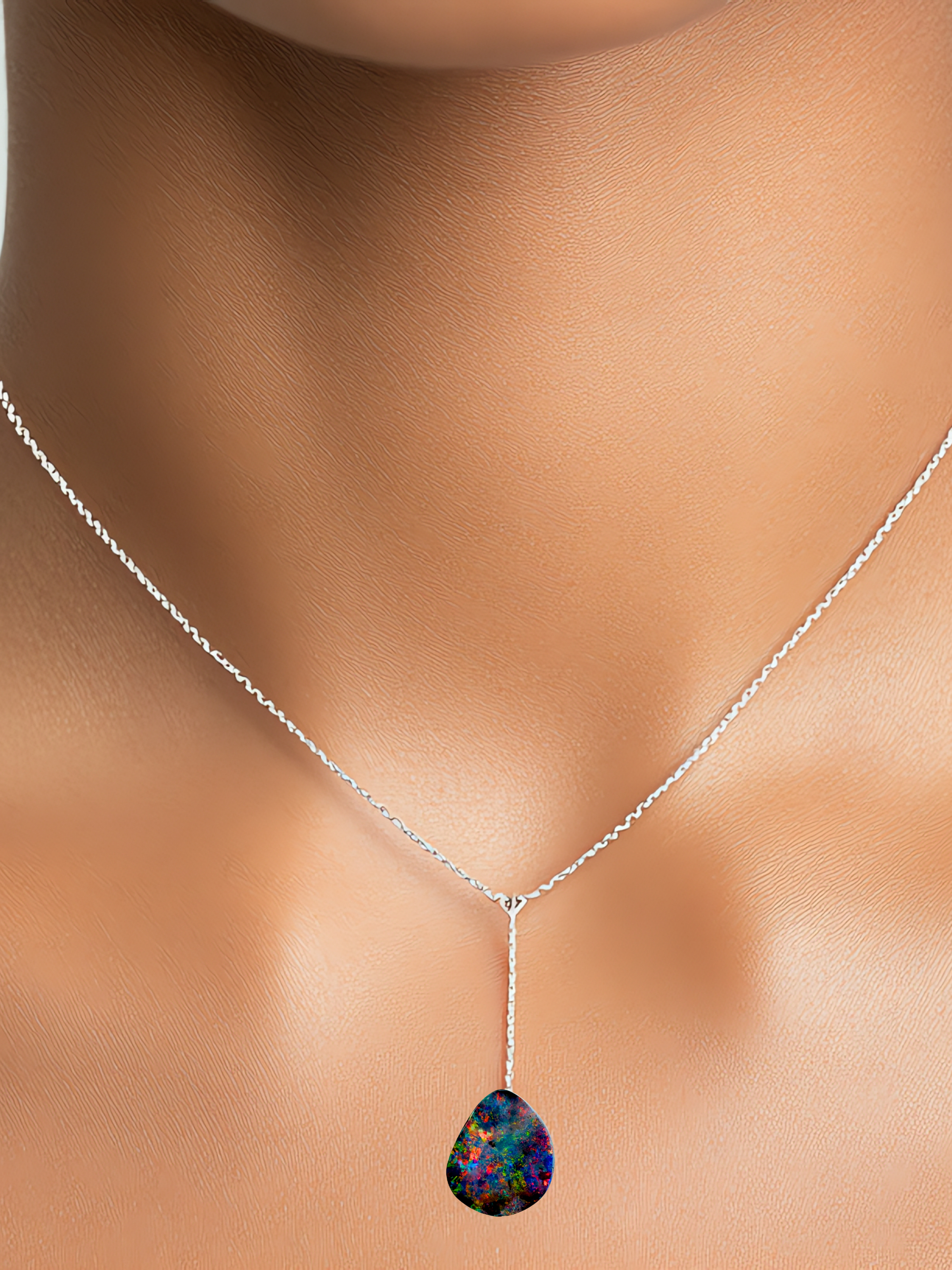 Necklace with a colorful opal silver pendant on a mannequin